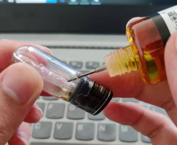 側面註油空煙彈.jpg 側面註油空煙彈